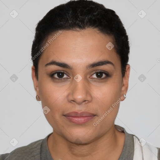 Joyful latino young-adult female with short  black hair and brown eyes