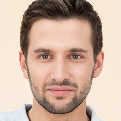 Joyful white young-adult male with short  brown hair and brown eyes