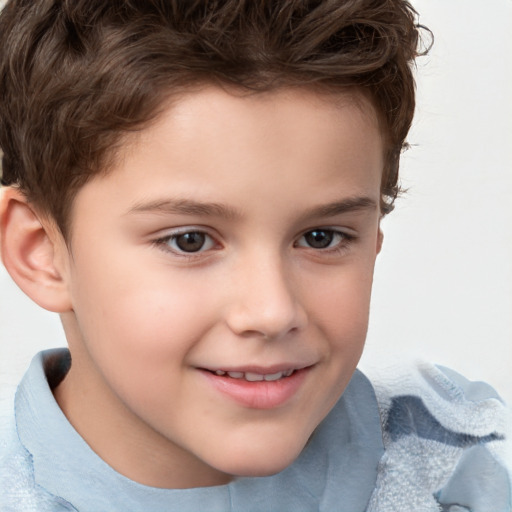 Joyful white child male with short  brown hair and brown eyes