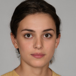 Neutral white young-adult female with medium  brown hair and brown eyes