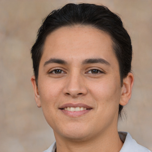 Joyful white young-adult male with short  brown hair and brown eyes