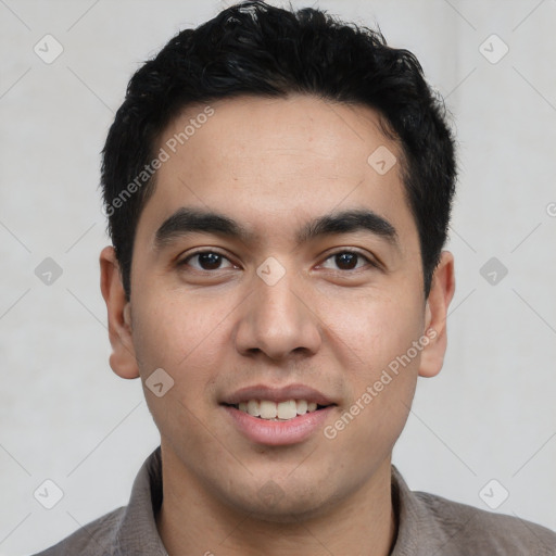 Joyful white young-adult male with short  black hair and brown eyes