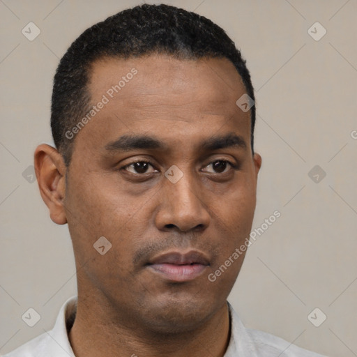 Neutral black young-adult male with short  black hair and brown eyes