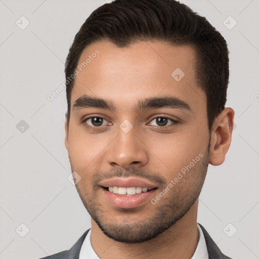 Joyful white young-adult male with short  brown hair and brown eyes