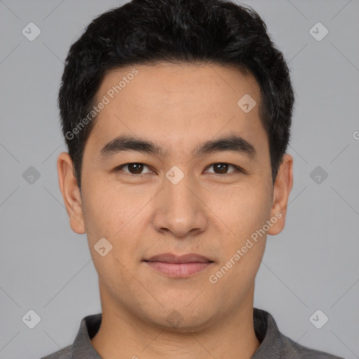 Joyful latino young-adult male with short  black hair and brown eyes