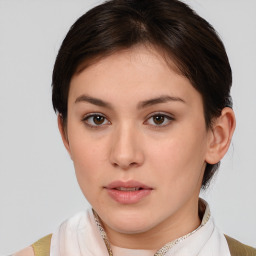 Neutral white young-adult female with medium  brown hair and brown eyes