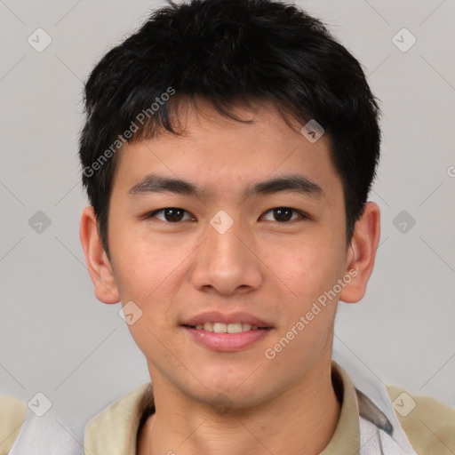 Joyful asian young-adult male with short  brown hair and brown eyes