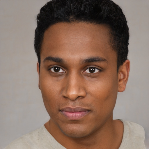 Neutral black young-adult male with short  black hair and brown eyes