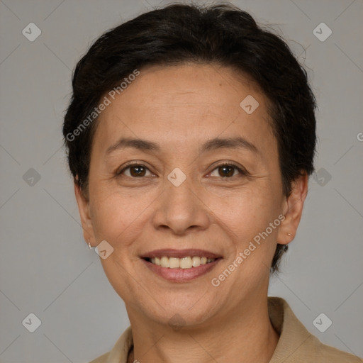 Joyful white adult female with short  brown hair and brown eyes