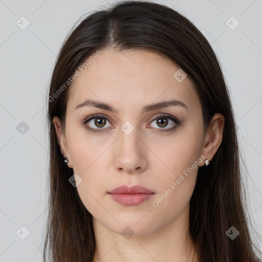 Neutral white young-adult female with long  brown hair and brown eyes