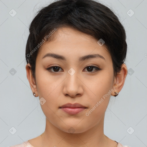 Joyful latino young-adult female with short  brown hair and brown eyes