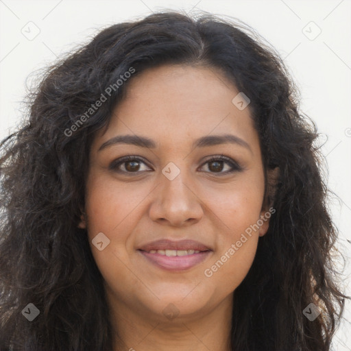 Joyful latino young-adult female with long  brown hair and brown eyes