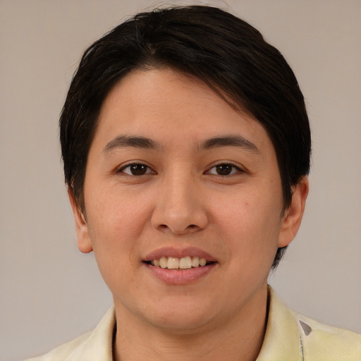 Joyful white young-adult female with short  brown hair and brown eyes