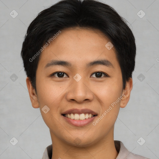 Joyful asian young-adult male with short  black hair and brown eyes