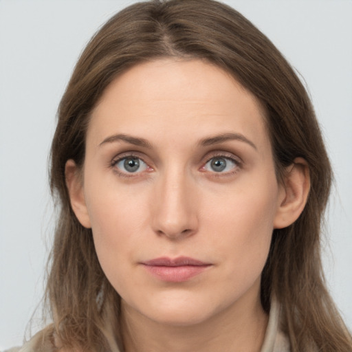 Neutral white young-adult female with long  brown hair and grey eyes