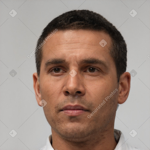 Neutral white adult male with short  black hair and brown eyes