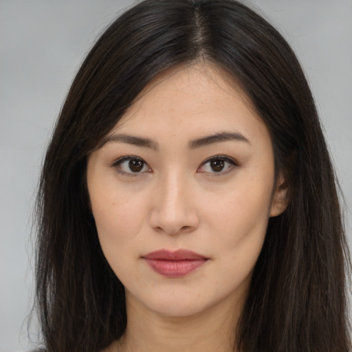 Neutral asian young-adult female with long  brown hair and brown eyes