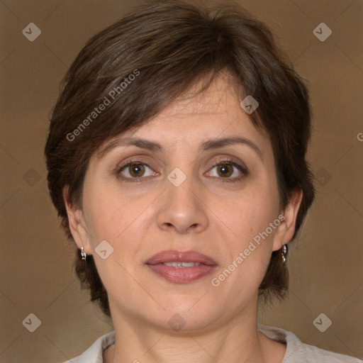 Joyful white adult female with medium  brown hair and brown eyes