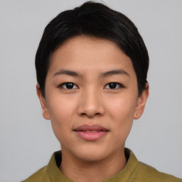 Joyful asian young-adult female with short  black hair and brown eyes