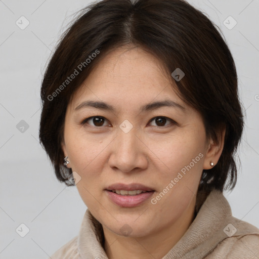 Joyful white adult female with medium  brown hair and brown eyes