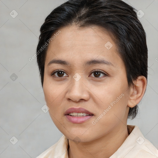 Joyful asian young-adult female with medium  brown hair and brown eyes