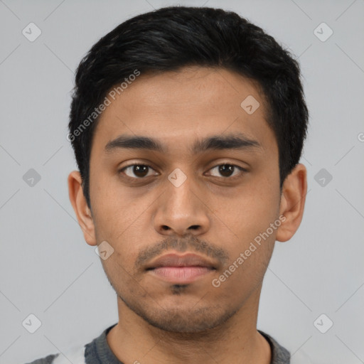 Neutral latino young-adult male with short  black hair and brown eyes