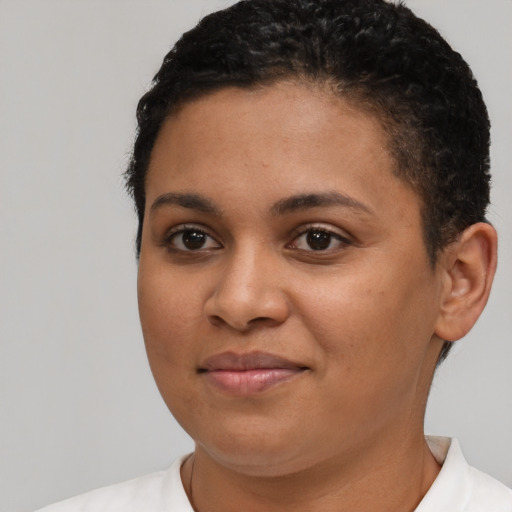 Joyful latino young-adult female with short  brown hair and brown eyes