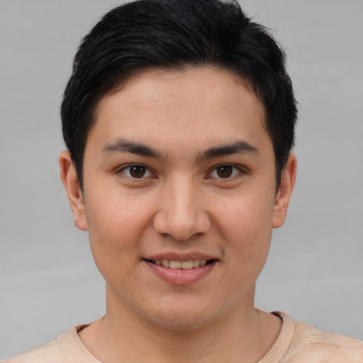Joyful asian young-adult female with short  brown hair and brown eyes