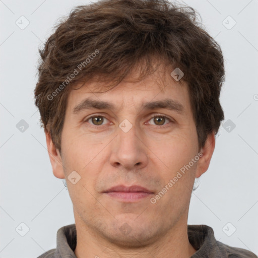 Neutral white adult male with short  brown hair and brown eyes