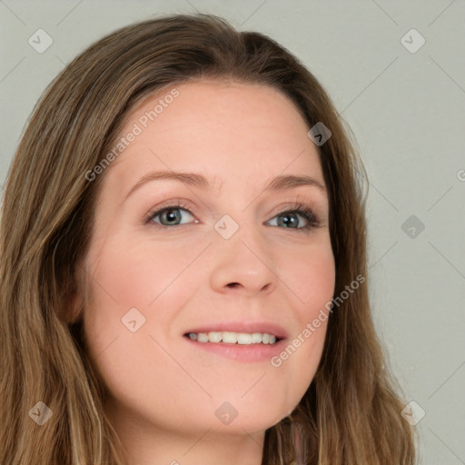 Joyful white young-adult female with long  brown hair and green eyes