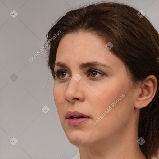 Neutral white young-adult female with medium  brown hair and grey eyes