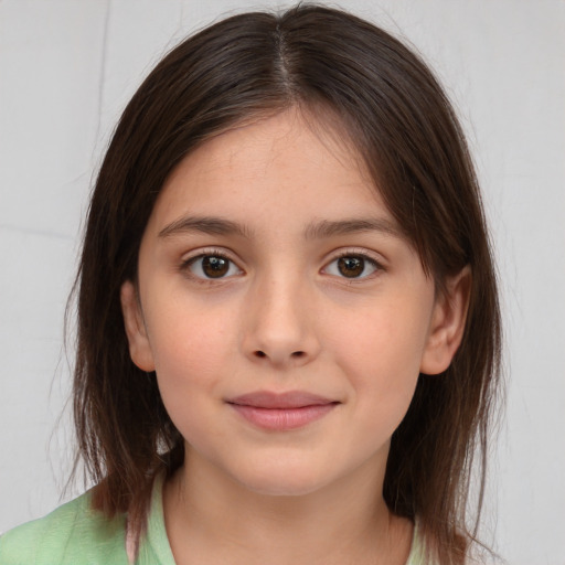 Joyful white child female with medium  brown hair and brown eyes