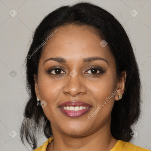 Joyful black young-adult female with medium  brown hair and brown eyes