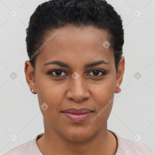 Joyful black young-adult female with short  brown hair and brown eyes