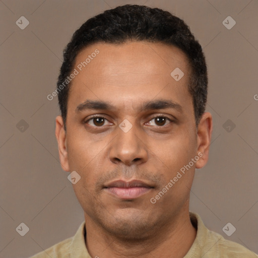 Neutral latino young-adult male with short  black hair and brown eyes
