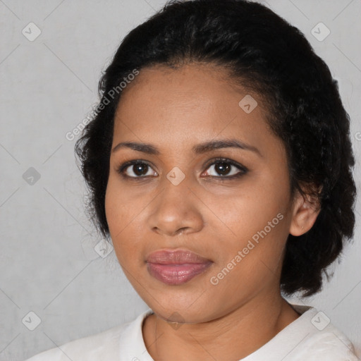 Joyful black young-adult female with medium  black hair and brown eyes