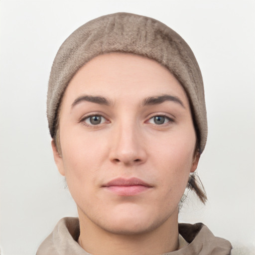 Neutral white young-adult female with short  black hair and brown eyes