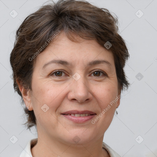 Joyful white adult female with short  brown hair and brown eyes