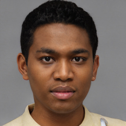 Neutral black young-adult male with short  black hair and brown eyes