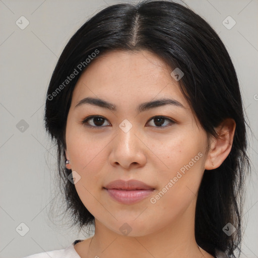 Joyful asian young-adult female with medium  black hair and brown eyes