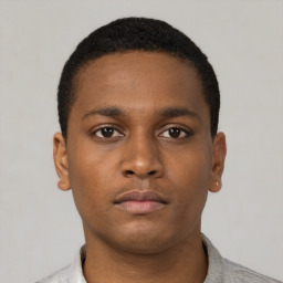 Neutral black young-adult male with short  brown hair and brown eyes