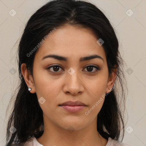 Joyful latino young-adult female with medium  brown hair and brown eyes