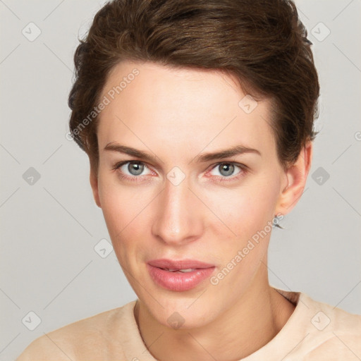 Joyful white young-adult female with short  brown hair and grey eyes