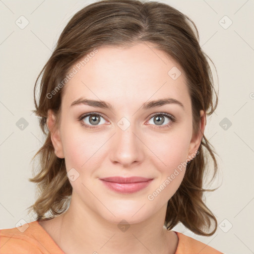 Joyful white young-adult female with medium  brown hair and green eyes