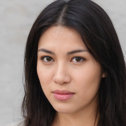 Neutral asian young-adult female with long  brown hair and brown eyes