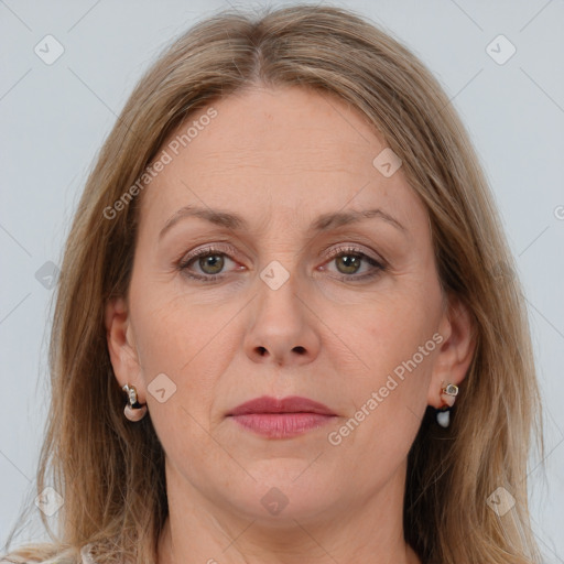 Joyful white adult female with medium  brown hair and grey eyes