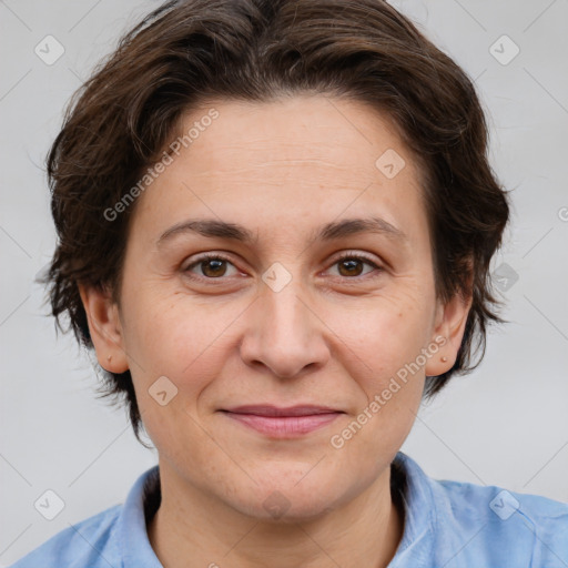 Joyful white adult female with short  brown hair and brown eyes