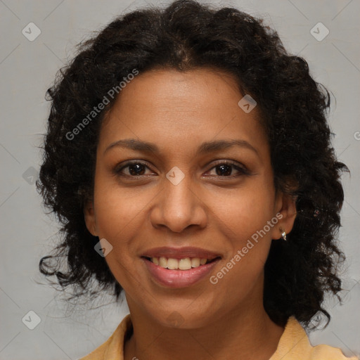 Joyful black young-adult female with medium  brown hair and brown eyes