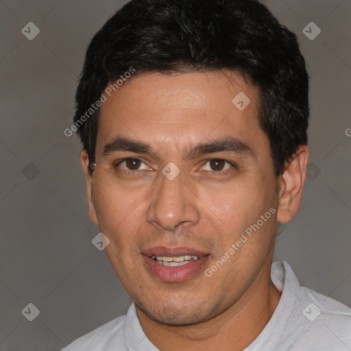 Joyful white adult male with short  black hair and brown eyes