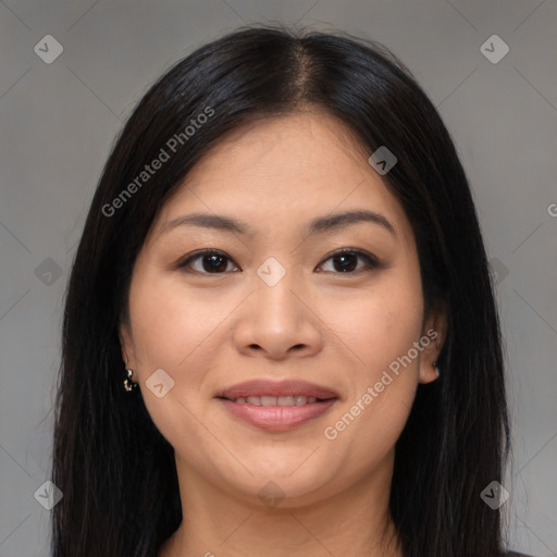 Joyful asian young-adult female with long  brown hair and brown eyes